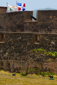 Built structure against trees on wall