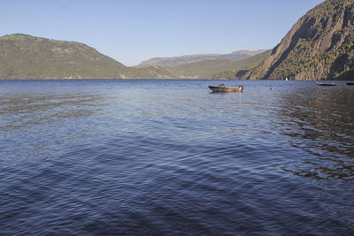 Scenic view of lake against clear sky