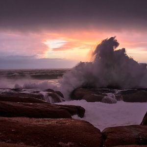 Scenic view of sea against sky during sunset