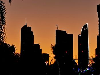 Silhouette of buildings at sunset