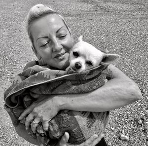 Portrait of woman with dog