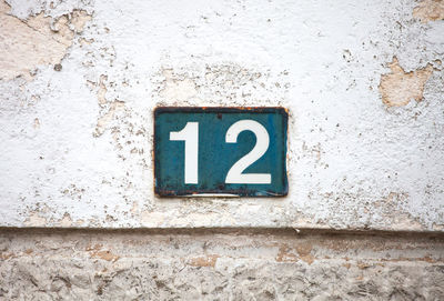 Close-up of text on wall