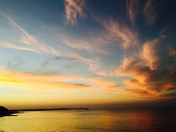 Scenic view of sea at sunset