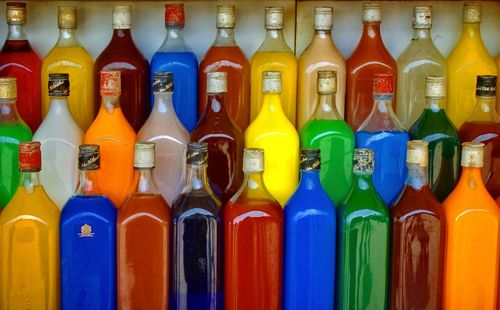 Full frame shot of multi colored bottles