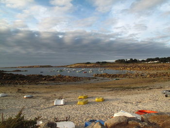 Scenic view of sea against cloudy sky