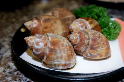 High angle view of meat in plate on table