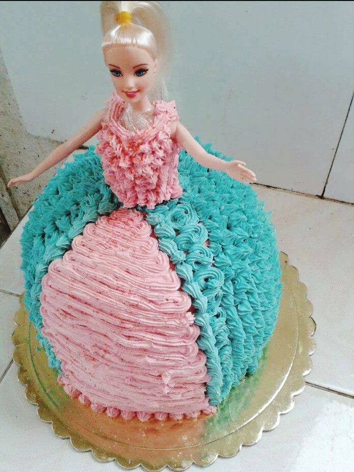 Blue and pink barbie cake