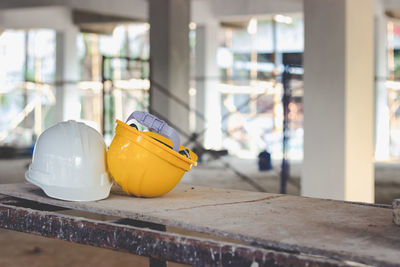 Hardhats on table in old building