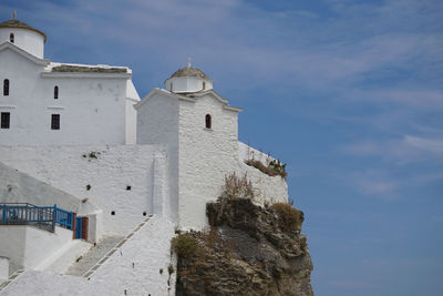 Low angle view of old church against sky