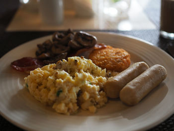 Close-up of breakfast served on table