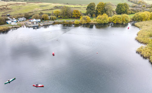 High angle view of lake by trees