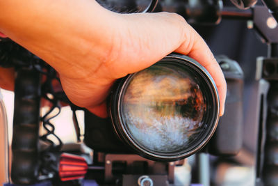 Cinema camera on film set, behind the scenes background, film crew production