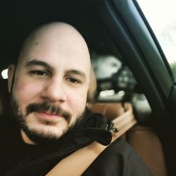 Portrait of man in car