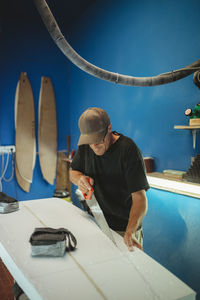 Man working in swimming pool