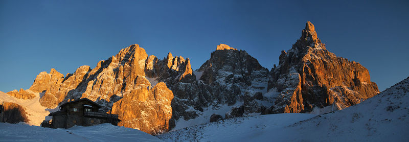 Italy, dolomities unesco heritage. scenic view of snowcapped  montains against clear sky. 