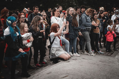 Group of people enjoying at music concert