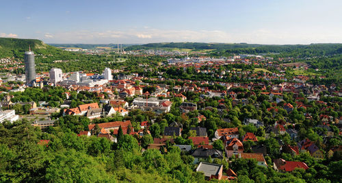 Houses in town against sky