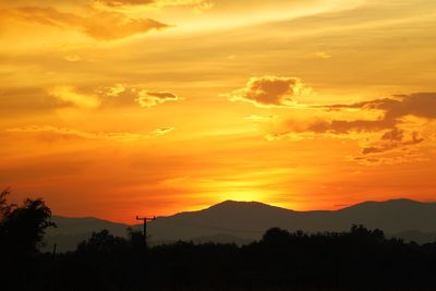 Scenic view of dramatic sky during sunset