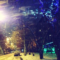 Illuminated street light at night