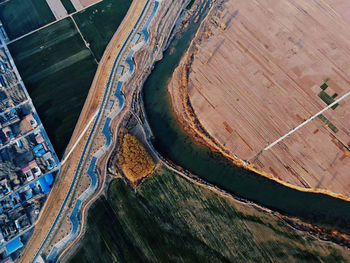 High angle view of river passing through land