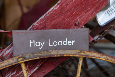 Close-up of text on rusty metal