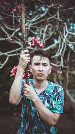 Portrait of young man looking away