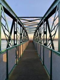 View of footbridge against clear sky