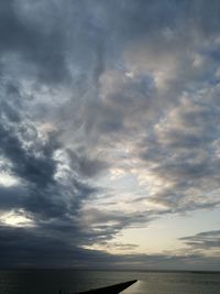 Scenic view of sea against dramatic sky