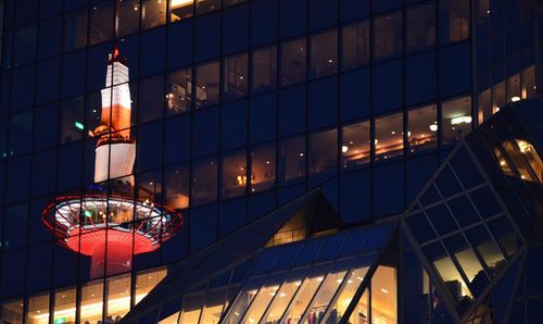 Low angle view of illuminated building at night