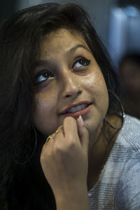 Close-up portrait of young woman