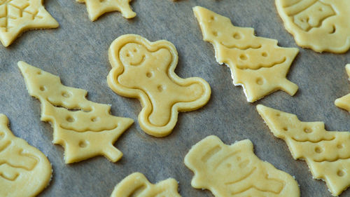 Raw christmas home made butter biscuits cookies. gingerbread man cookie. 