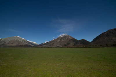 Amazing scenic view of snow capped mountains range in arthur's pass route, new zealand.