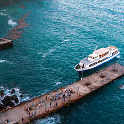 High angle view of boats moored on sea