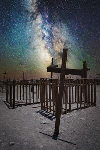 Scenic view of beach against sky at night