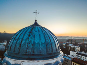 Cathedral against sky at sunset