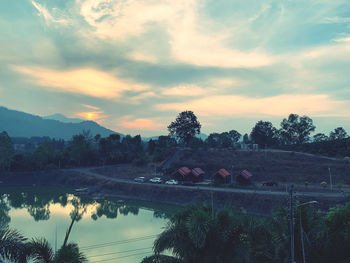 Scenic view of lake against sky during sunset