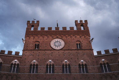 Low angle view of historical building against sky