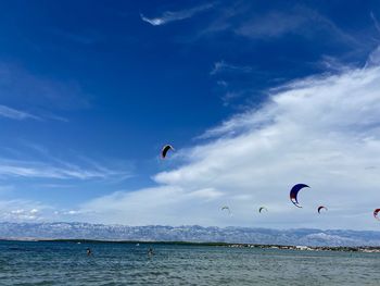 Scenic view of sea against blue sky