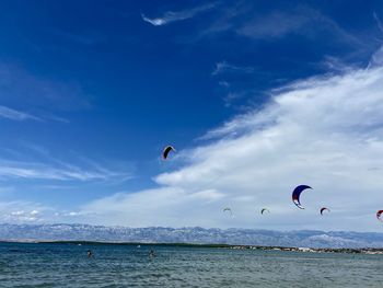 Scenic view of sea against blue sky