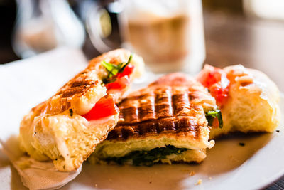 Close-up of hot dog in plate on table