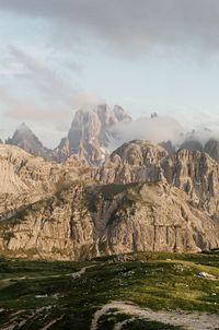 Scenic view of landscape and mountains against sky