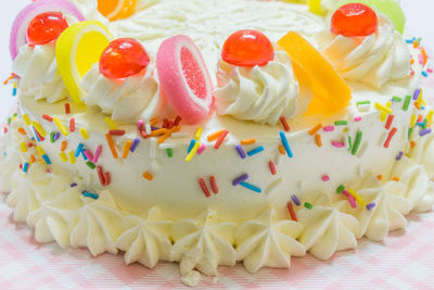 Close-up of multi colored cake on table