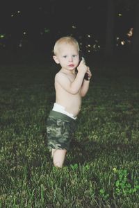 Cute boy in field