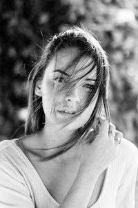 Close-up portrait of a smiling young woman