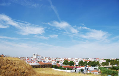 View of residential district against sky