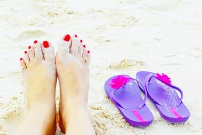 Low section of woman on beach