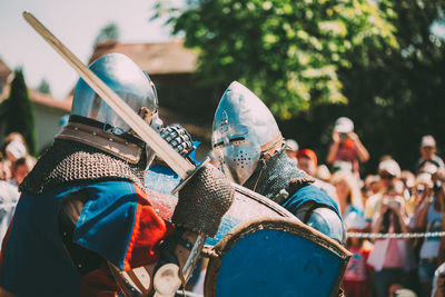 Rear view of people in traditional clothing