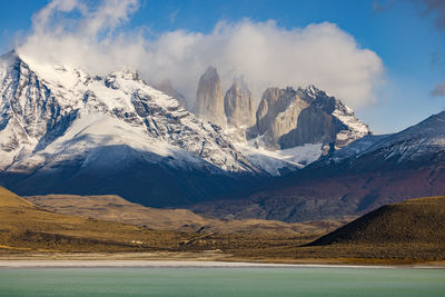 The rocks and towers in the torres del paine massif in front of laguna amarga in chile
