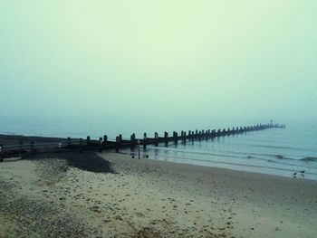 Scenic view of calm sea against sky