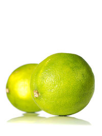 Close-up of fruit on white background